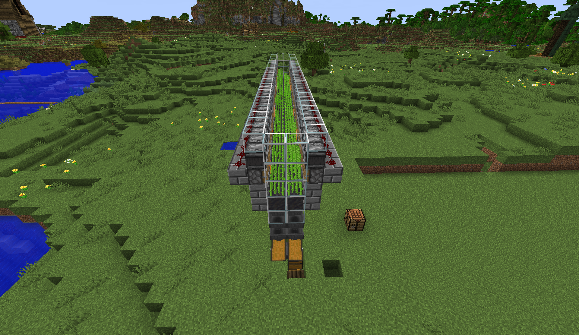 Long glass-enclosed automatic sugarcane farm with hopper collection