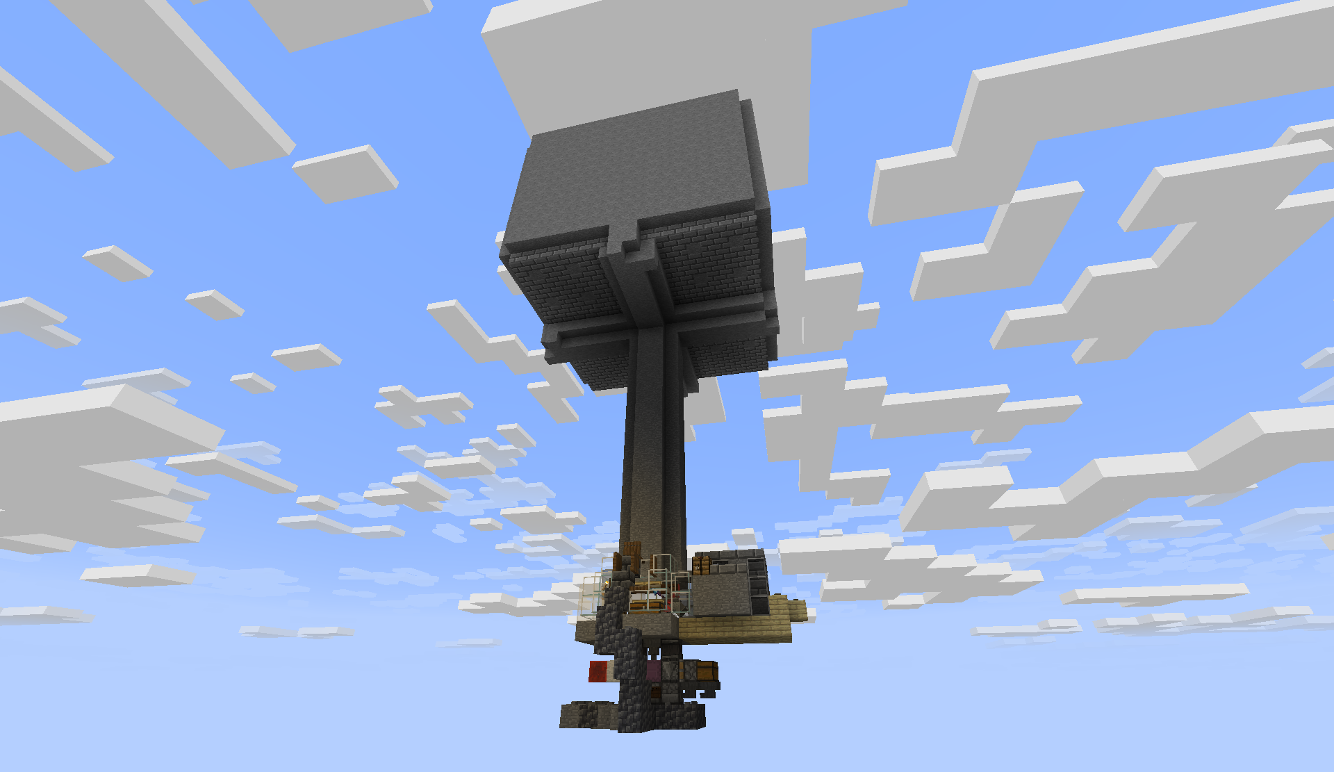 Sky-high dark stone mob farm tower with a collection platform at the base