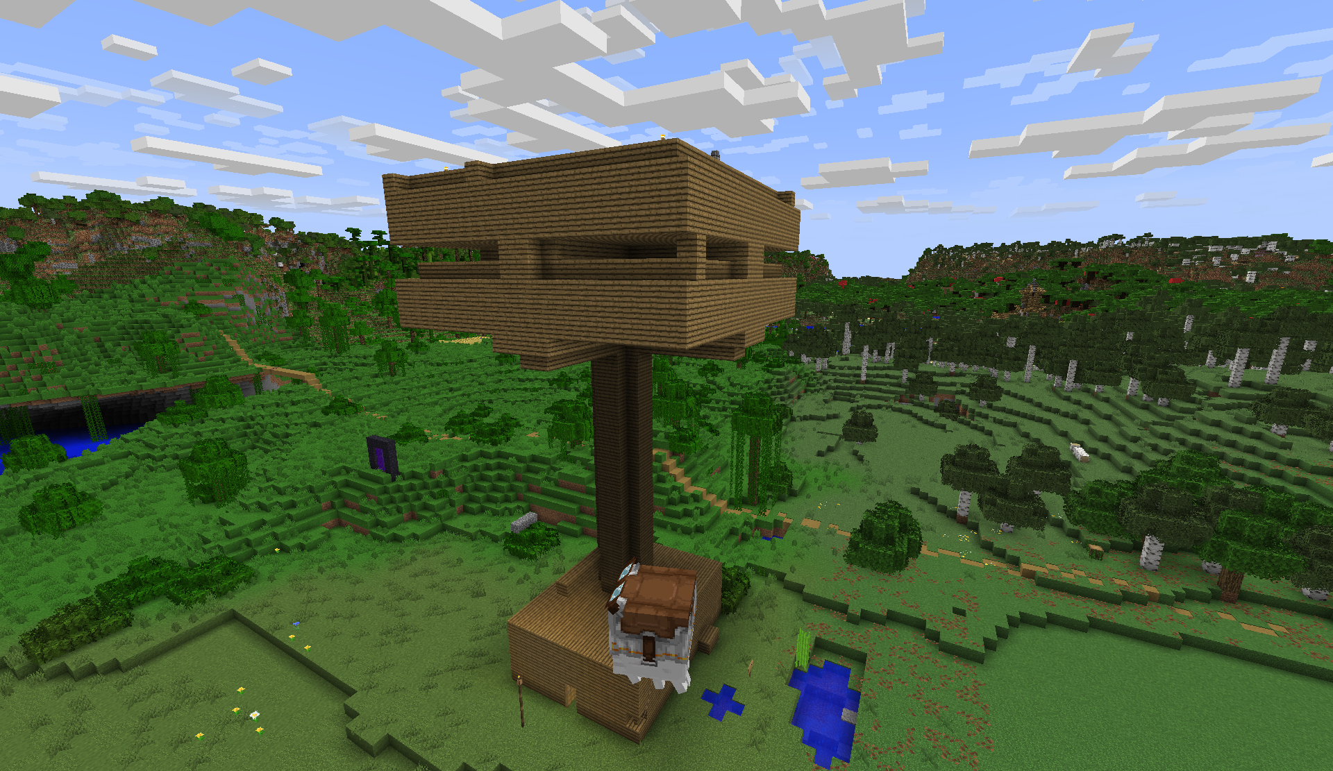 Tall wooden T-shaped farm tower in a forest valley