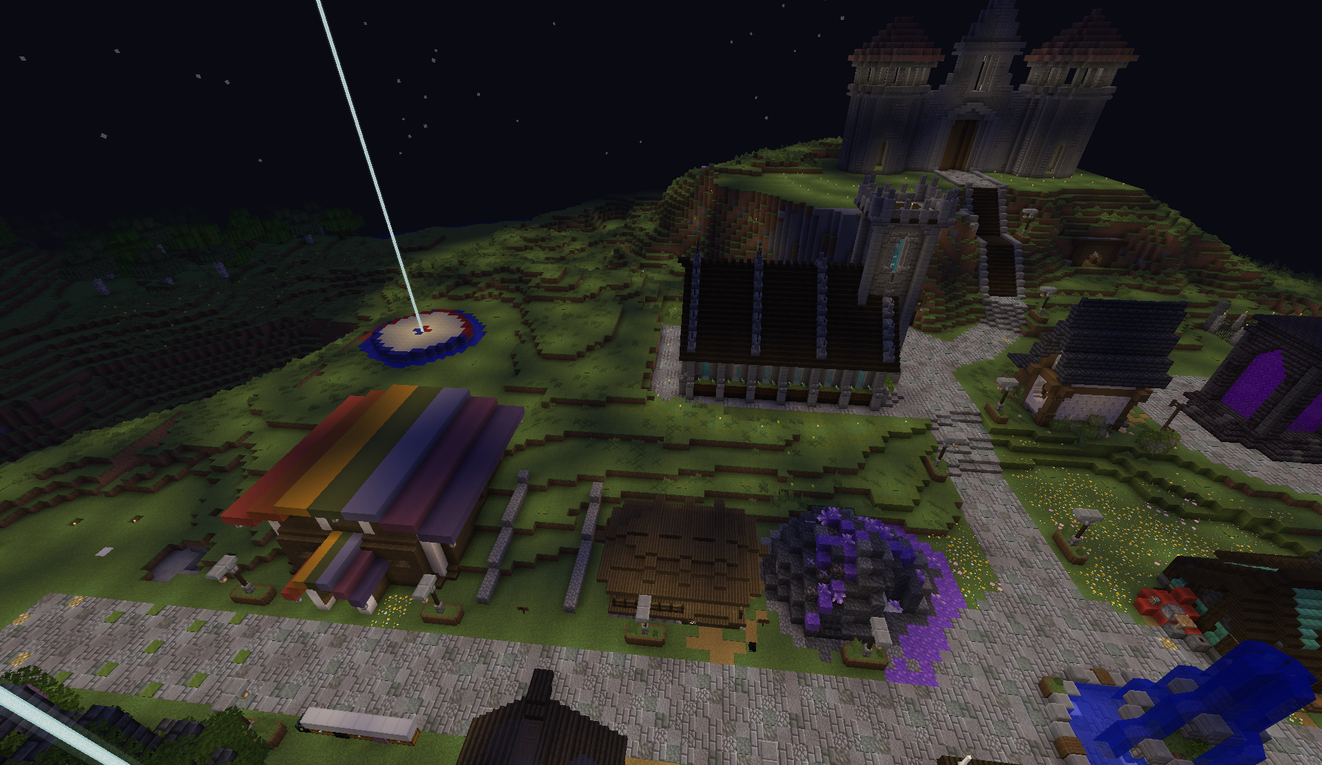 Night overview of the shopping district with castle, rainbow shop, and nether portal