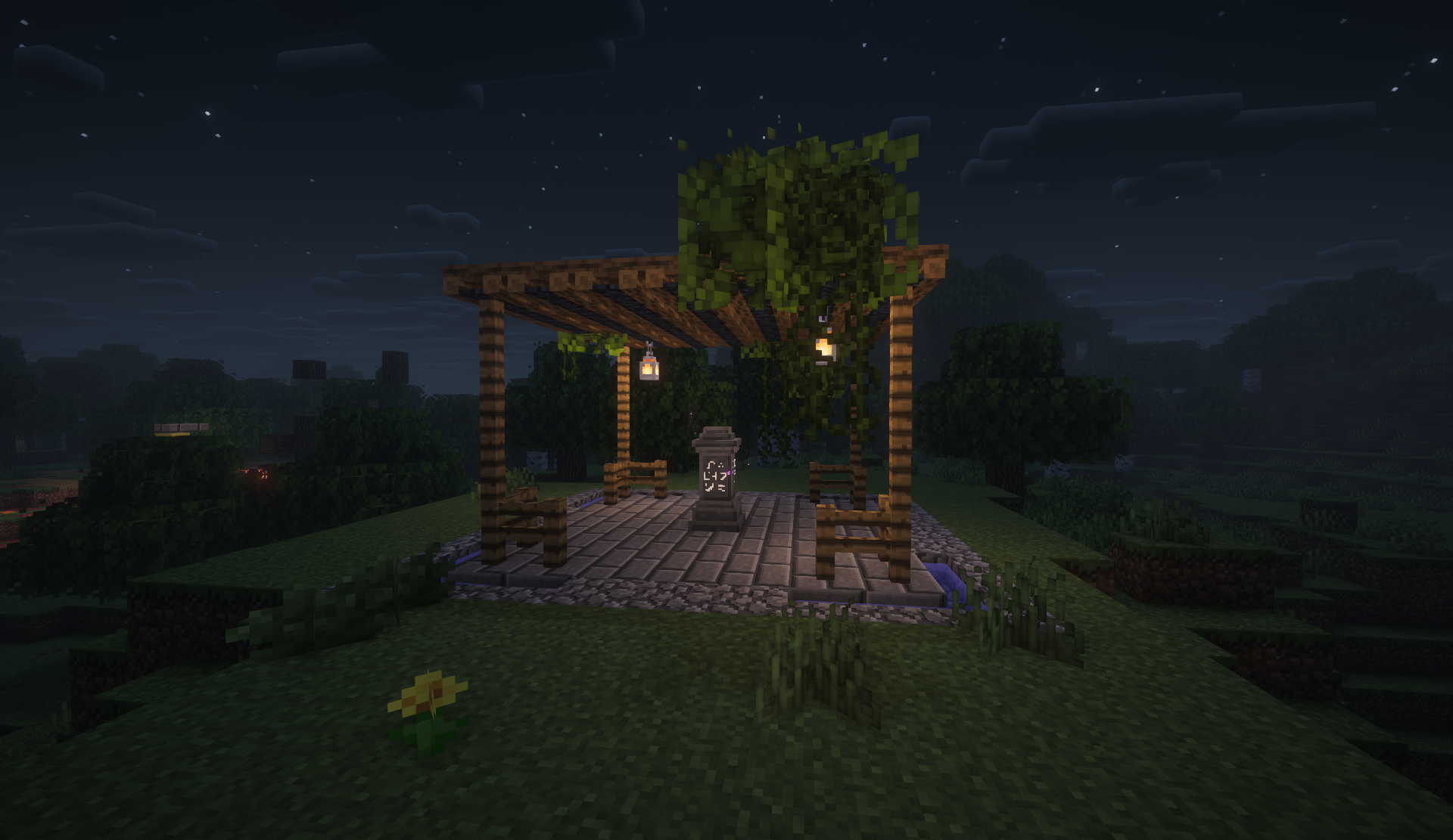 Vine-covered wooden gazebo with a waystone on a grassy hill at night