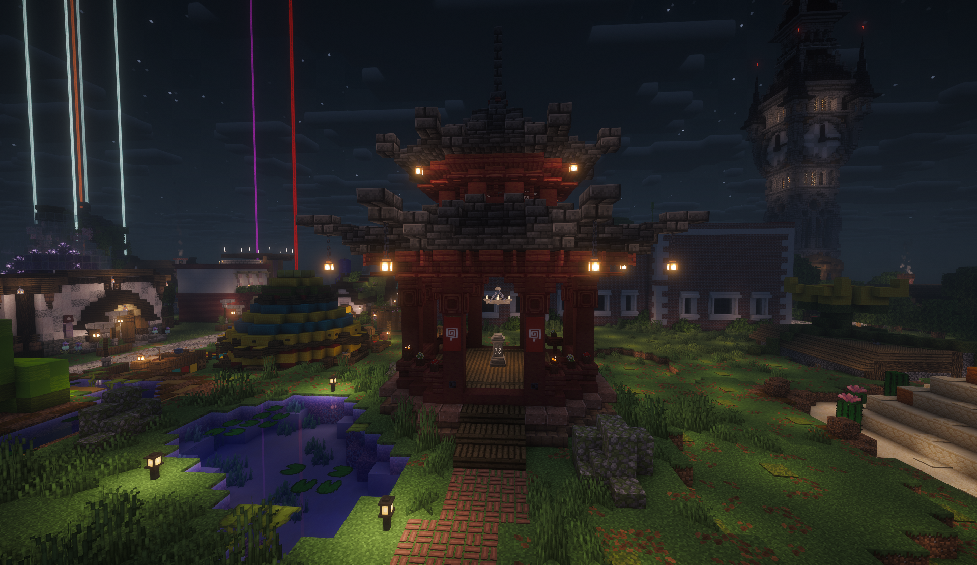 The Market District Waystone under a lantern-lit pagoda gazebo at night, with shops and a clock tower nearby