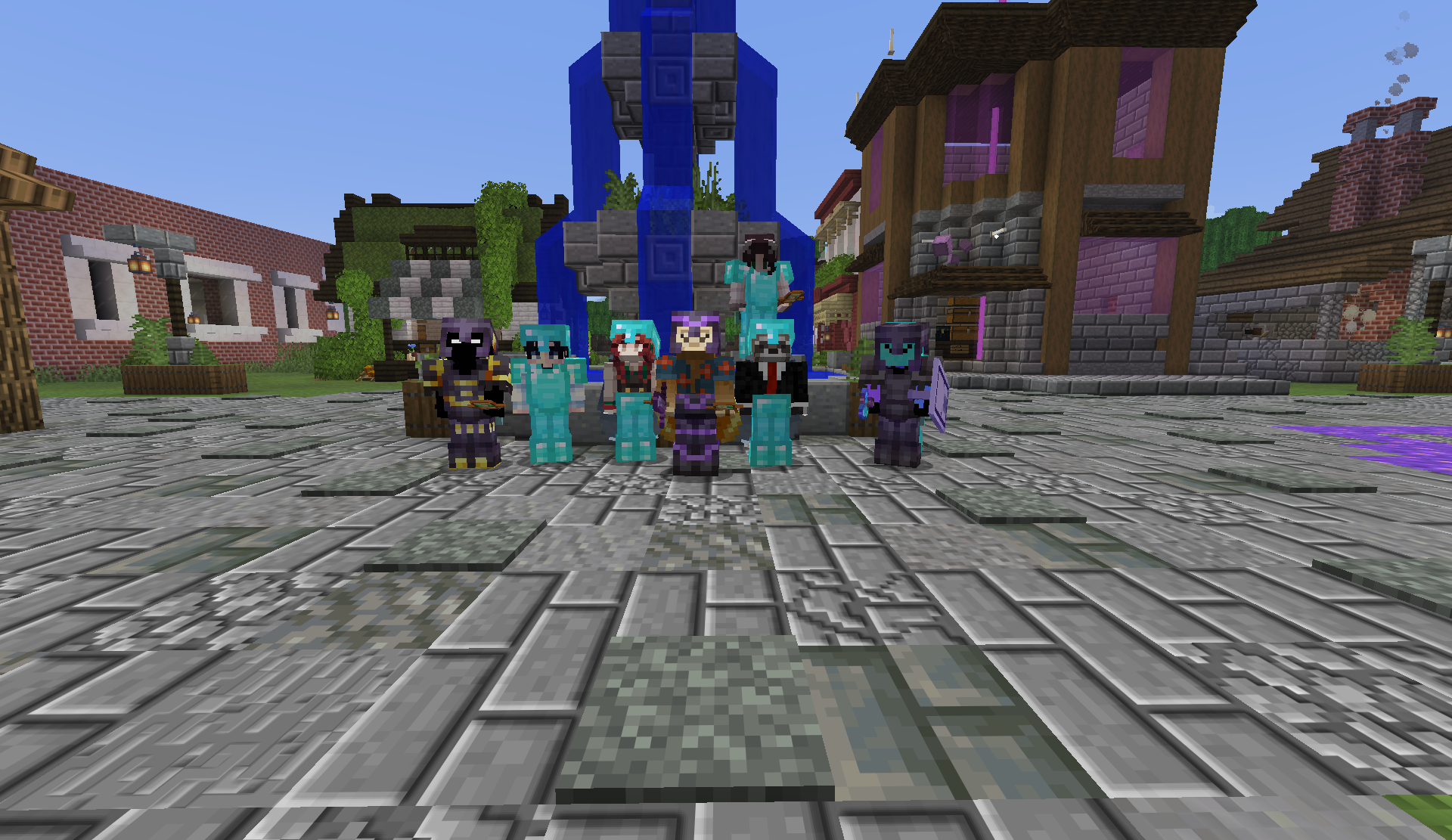 Players lined up for a group photo beside the Market District fountain