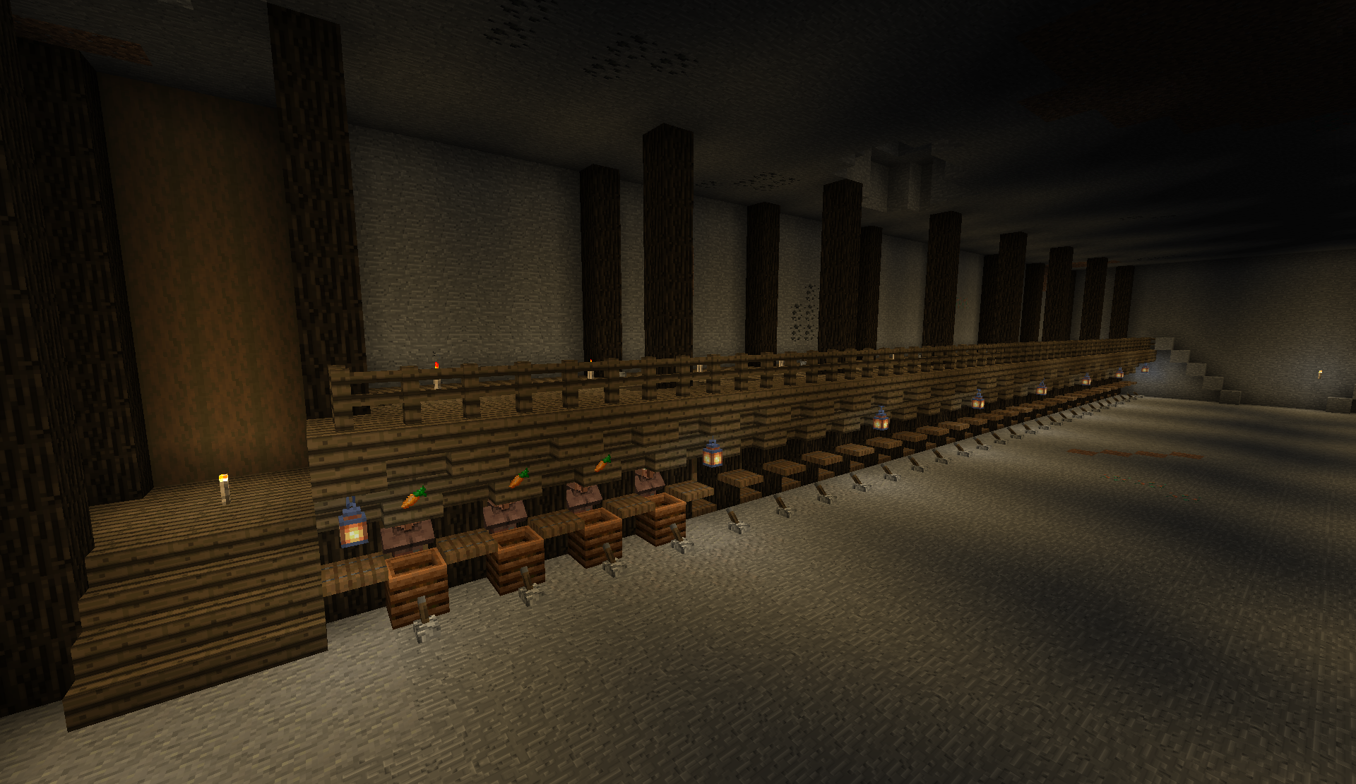Underground farm hall with wooden platforms, lanterns, and rows of chests