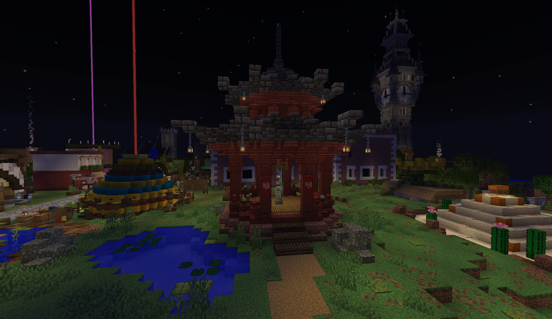 Waystone Gazebo at night, with the Market District clock tower in the background